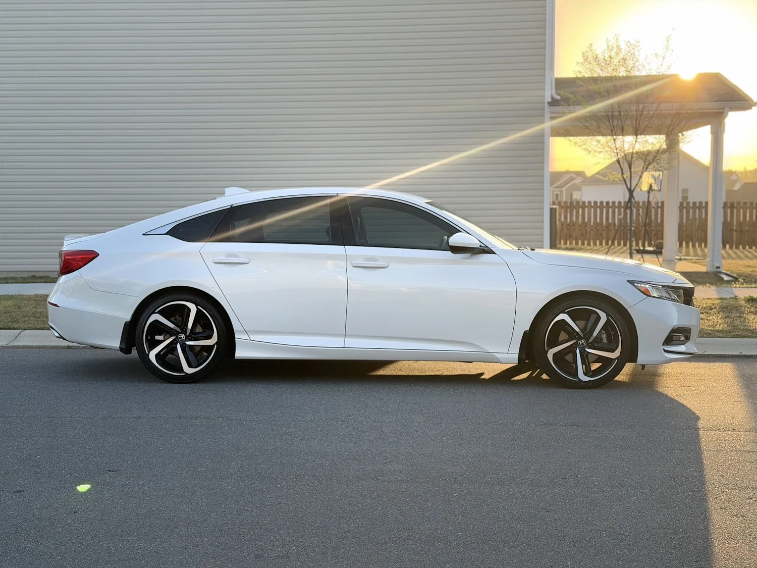 White Accord, back to showroom, after